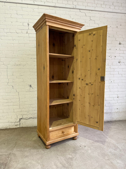 A Tall and Narrow Antique Pine European Cupboard with Bottom Drawer c. 1900