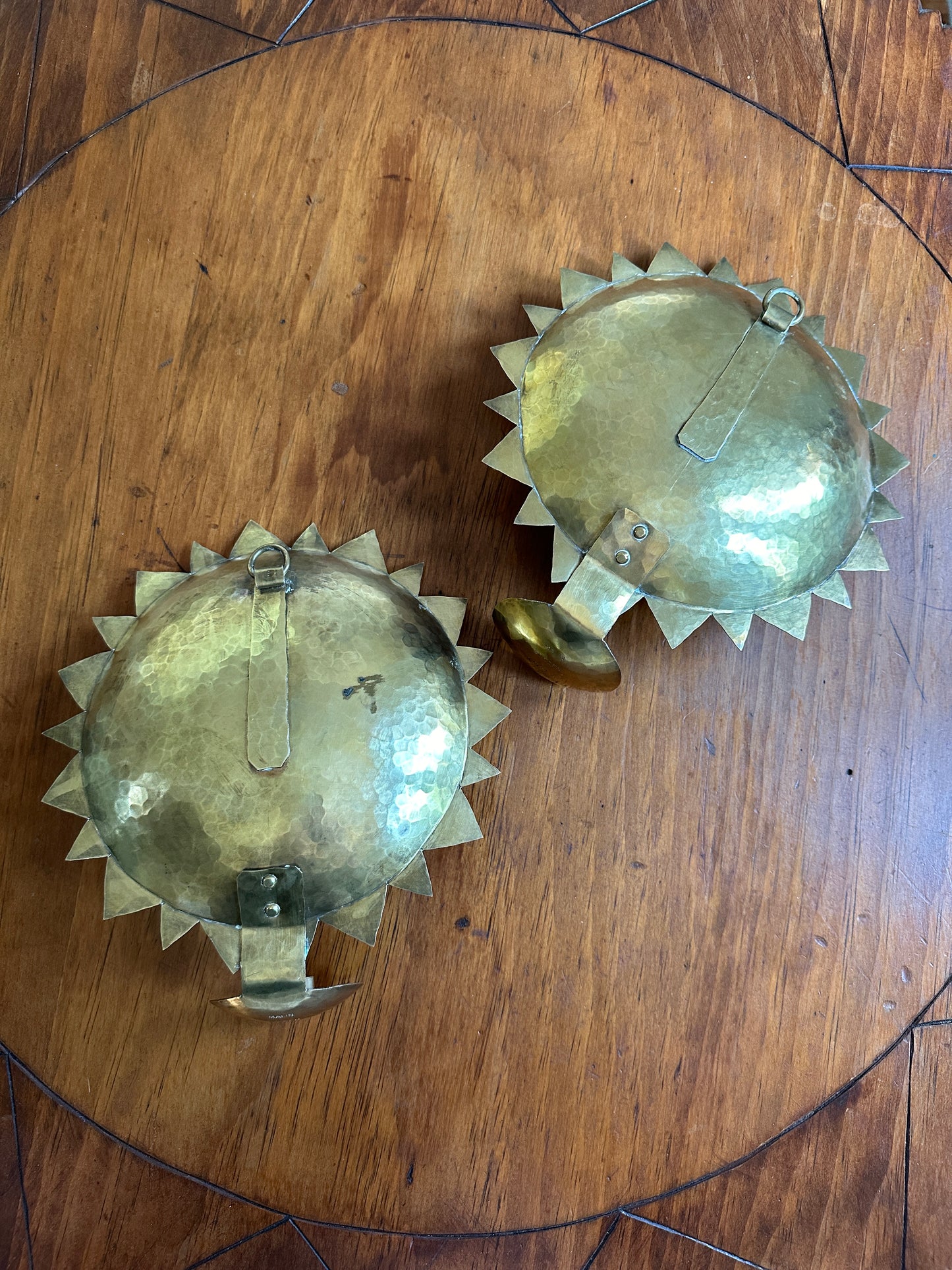 A Pair of Swedish Hammered Brass Sun Sconces